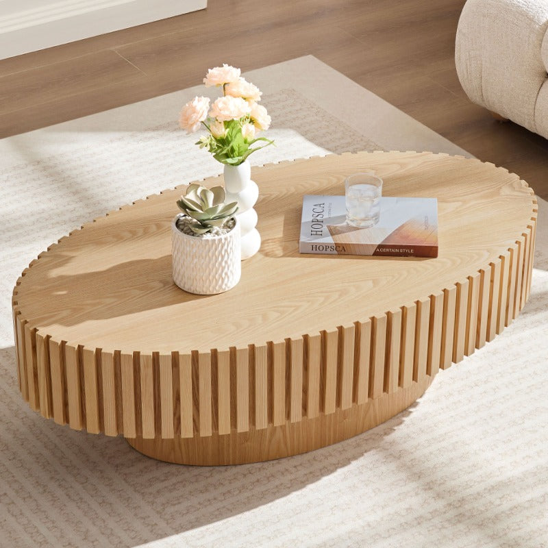 Contemporary Handcrafted Drum-Shaped Coffee Table, Measuring 43.7 Inches in Length, Designed in an Oval Shape for The Living Room. This Compact Coffee Table Boasts a Robust Pedestal Base And Is Made from Natural Ash, Perfect for Modern Home Decor.