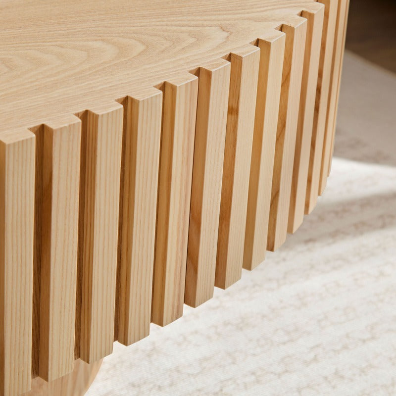 Contemporary Handcrafted Drum-Shaped Coffee Table, Measuring 43.7 Inches in Length, Designed in an Oval Shape for The Living Room. This Compact Coffee Table Boasts a Robust Pedestal Base And Is Made from Natural Ash, Perfect for Modern Home Decor.