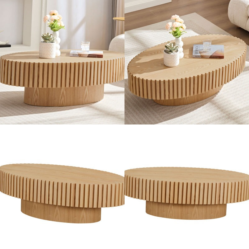 Contemporary Handcrafted Drum-Shaped Coffee Table, Measuring 43.7 Inches in Length, Designed in an Oval Shape for The Living Room. This Compact Coffee Table Boasts a Robust Pedestal Base And Is Made from Natural Ash, Perfect for Modern Home Decor.